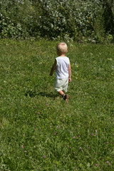 Boy walking on the park