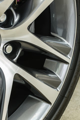 metal silver car wheel detail closeup