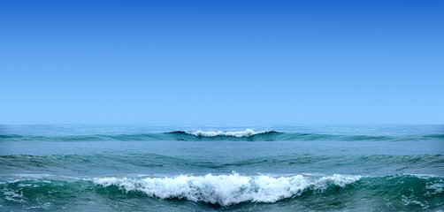 Seascape image of beautiful close up waves in moody rainy morning