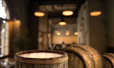 blurred background of bar and dark brown desk space of retro wood