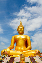 Obraz premium Big Golden Buddha with blue sky blue at Wat Muang, Ang Thong Province, Thailand