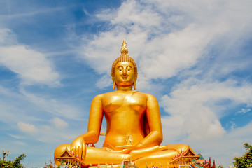 Obraz premium Big Golden Buddha with blue sky blue at Wat Muang, Ang Thong Province, Thailand