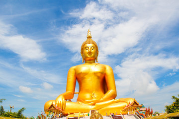 Big Golden Buddha with blue sky blue at Wat Muang, Ang Thong Province, Thailand