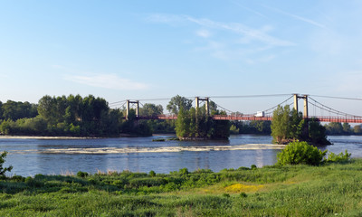 Fototapeta na wymiar suspension bridge of Meung sur Loire in centre-Val de loire region