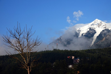 close up fogy mountains and forest over sunny and cloudy morning sky in Kayseri, Turkey