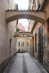 Fototapeta premium An old narrow street in Prague