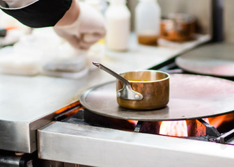 Chef preparing food, meal, in the kitchen, chef cooking