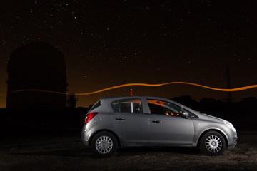 Obraz na płótnie Canvas Car and observatory under the stars in Calar Alto Almeria