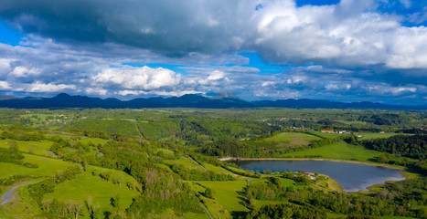 chain of puys in france, green landscape and lake