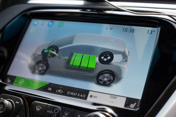 Information on the display of the electric charge level in car. eco electric car system with...