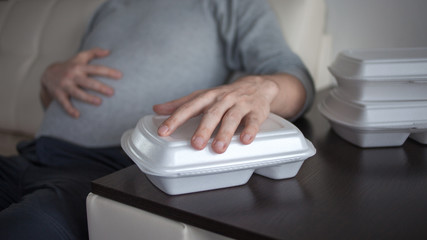 Fototapeta premium Food delivery from the restaurant. Problems of poor quality products and food allergies.