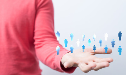 teamwork - Stack of hands showing unity and teamwork .