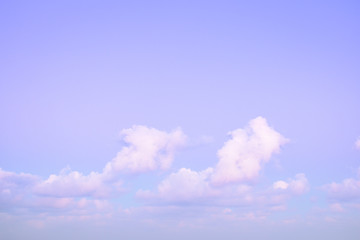 Obraz premium pretty pastel colour sky purple blue with fluffy cloud 