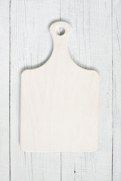 White background with empty cutting board