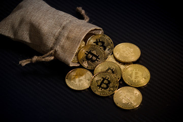 bit coin in bucket falling blockchain technology