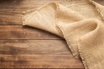 burlap hessian sacking on wooden background