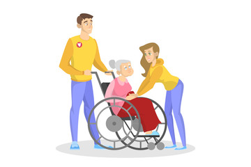 Volunteer help old disabled person in wheelchair