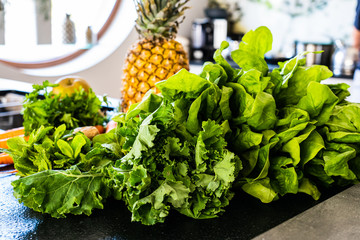 Raw vegetables and fruits on table
