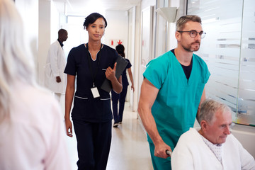 Fototapeta premium Busy Hospital Corridor With Medical Staff And Patients