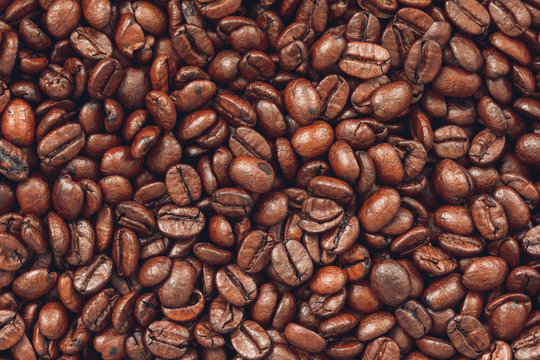 Macro photo of roasted coffee beans background
