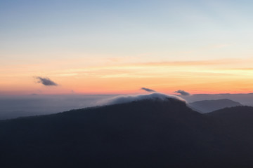 The sunrise view with mist on the mountian at Pha Mor E Dang, Khao Phra Wihan National Park, Thailand.