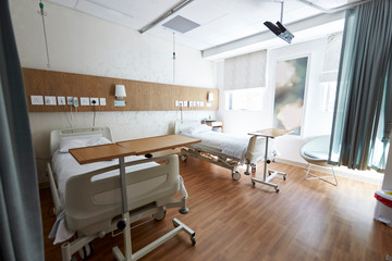 Beds In Empty Hospital Ward