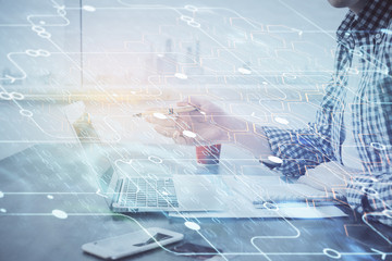 Businessman working on Laptop with technology theme drawing. Concept of big data. Double exposure.