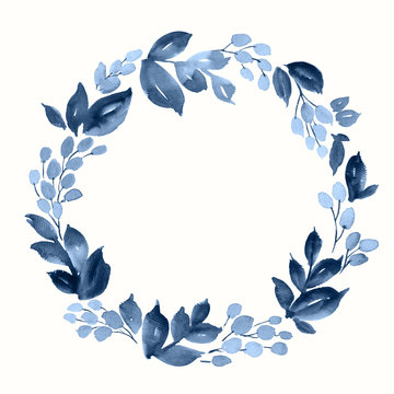 Watercolor wreath of leaves and berries in indigo blue. Hand painted floral composition