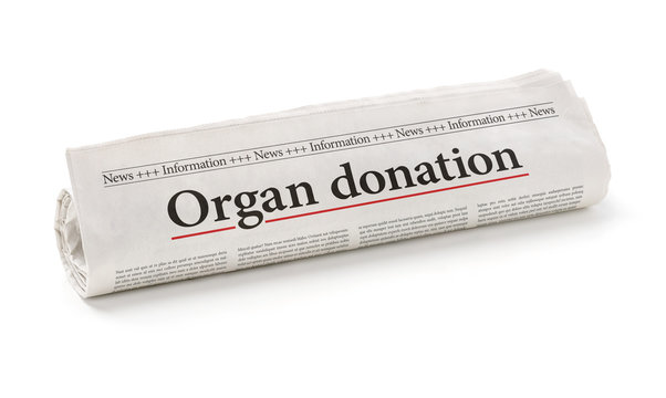 Rolled newspaper with the headline Organ donation