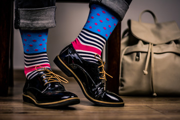 Colorful socks on female feet