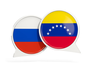Fototapeta premium Flags of Russia and venezuela inside chat bubbles