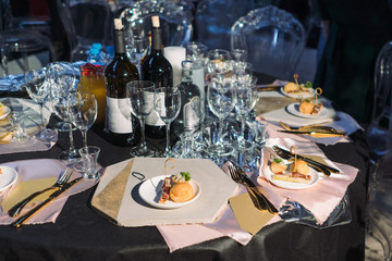Table wares in the restaurant, gold plated cutlery.