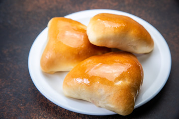 assorted fresh lush buns and pies