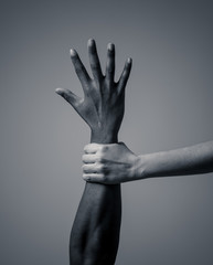 Conceptual image of people of different races together against racism and united for human rights