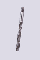 Concrete drill bit isolated on white background. Metal tool for perforator, vertical image.
