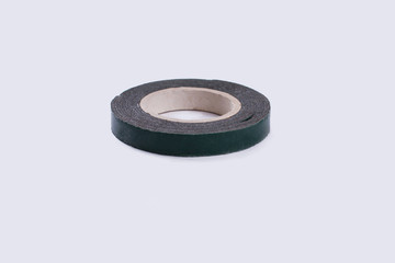 Roll of adhesive tape isolated on white background. Repair tape roll.
