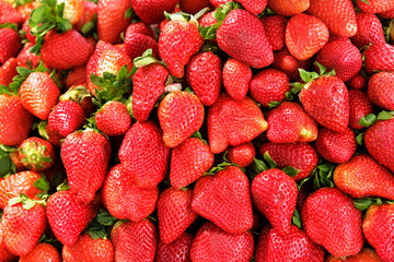 Background of fresh strawberry at market stall in southern Spain