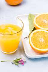 Obraz na płótnie Canvas Fresh and delicious oranges and orange juice