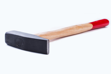 Metal mallet on white background. Steel hammer, studio shot. Building instrument, horizontal image.