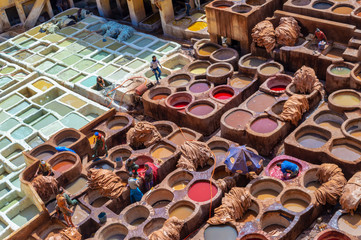 Aerial view of the colorful leather tanneries of Fez, Morocco - obrazy, fototapety, plakaty