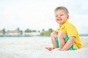 Fototapeta na wymiar Three year old toddler boy on beach