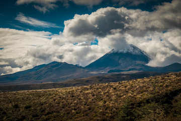 Mount Ngauruhoe wrapped in clouds in Tongariro National Park, New Zealand North Island