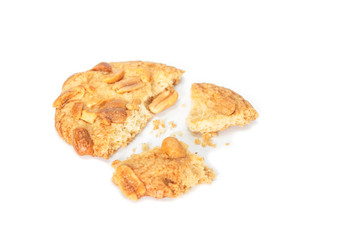 peanut cookie broken on white background.