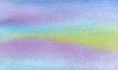 turquoise purple blue pink and yellow watercolor blurs hand drawn abstract background on textured paper