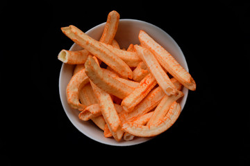 Sweet and delicious savory snacks from Indonesia, these foods are often served for snacks. snack on a plate with a blank black background