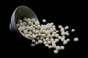 Kacang Atom, processed traditional peanuts from Indonesia. Kacang atom on a plate with a blank...