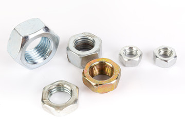 Steel nuts on a white background