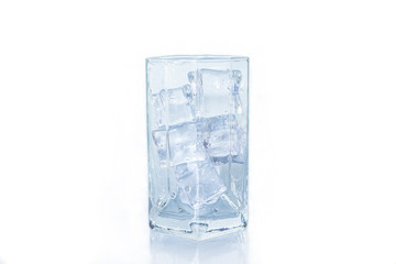 Glass of ice cube on white background.