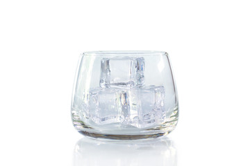 Glass of ice cube on white background.
