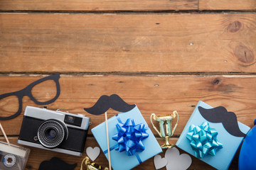 Father's Day background concept with presents, mustache and trophy